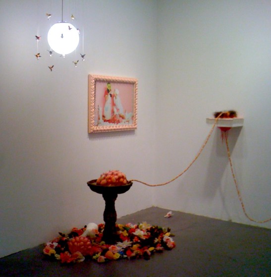 For works by Kikuko Tenaka, Clockwise, Hummingbirds, Still Photo from perfromance of Tragic Bambi, Empathy, and Piss Fountain